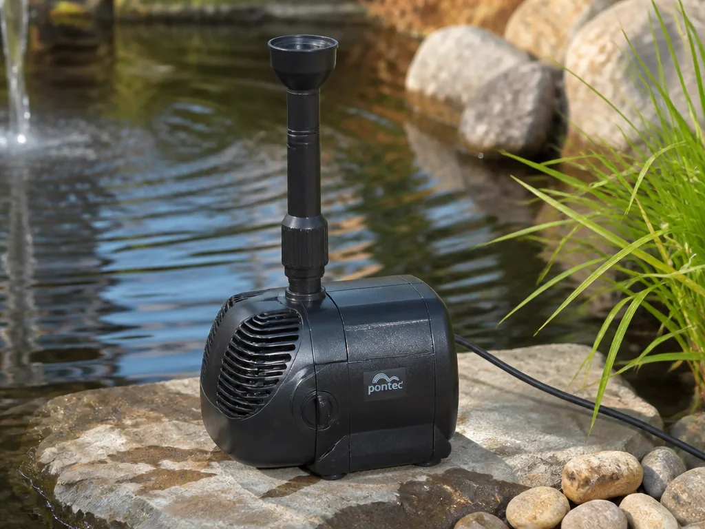 Pompe de fontaine immergée projetant un jet vertical dans un bassin